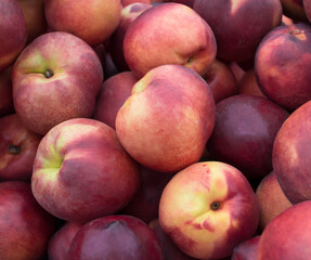 Fototapeta na wymiar Fresh organic peach. Heap of fresh ripe peaches.
