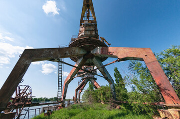 Abandoned dock cranes in Prypiat, Chernobyl exclusion Zone. Chernobyl Nuclear Power Plant Zone of...