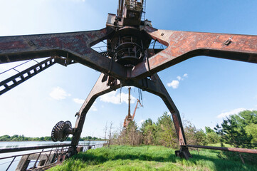 Abandoned dock cranes in Prypiat, Chernobyl exclusion Zone. Chernobyl Nuclear Power Plant Zone of...