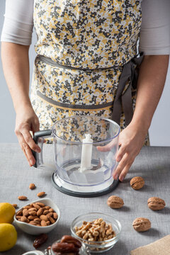 Woman using a kitchen robot