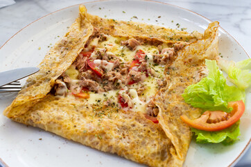 Crepes with tuna and cheese - 364562171