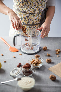 Woman using a kitchen robot