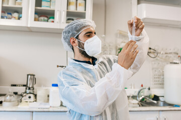 Protected scientist working in the lab