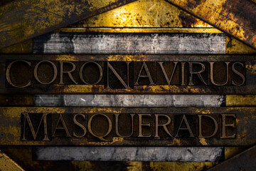 Coronavirus Masquerade text formed with real authentic typeset letters on vintage textured silver grunge copper and gold background