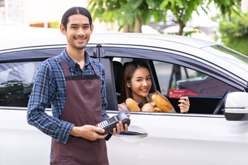 asian woman making contactless payment for grocery