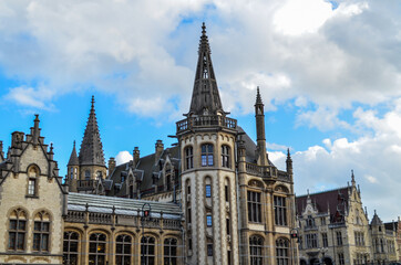 Fototapeta na wymiar Stunning architecture in the center of Ghent, Belgium. This part of the city has old buildings, castles and large churches.