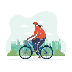 young afro woman riding bicycle wearing medical mask