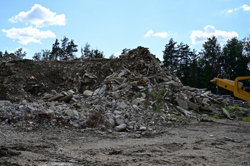Photo of mountains of garbage outdoors against a blue sky