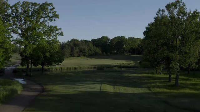 4K Aerial Shot of Golf Course in Summer