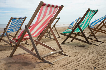 Fototapeta na wymiar Sun loungers out for hire on Mablethorpe beach.
