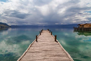 Fotobehang Wooden pier on the Lake Ohrid, in Macedonia © MehmetOZB