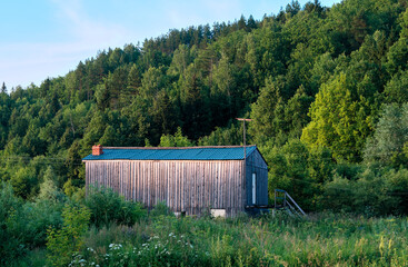 old barn in the mountains.summer landscape