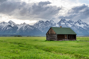 Mormon Row in Jackson Hole, Wyoming on a partially cloudy day