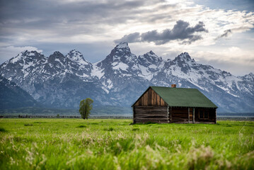 Mormon Row in Jackson Hole, Wyoming on a partially cloudy day