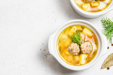  Classic homemade meatball soup. Space for text, top view.