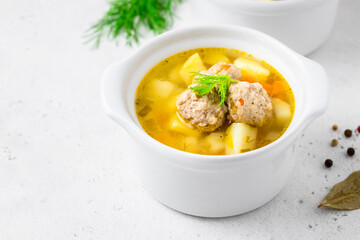 Healthy homemade meatball soup. Space for text.