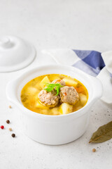 Light low calorie healthy  meatball soup. Space for text.