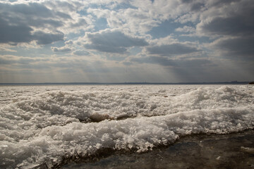 clouds and frozen river