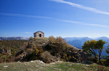 Fototapeta na wymiar The chapel Saint-Michel de Cousson in the mountains of Digne les Bains, France