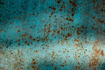 texture of old blue metal with rust spots of different sizes on it