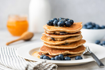 Homemade pancakes with blueberries. Stack of tasty pancakes
