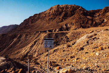 Falling hazard attention sign, Dead Sea Scrolls Israel.