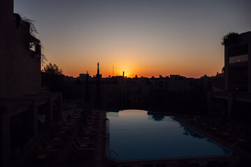 Sunset on the swimming pool, city of Jerusalem Israel.