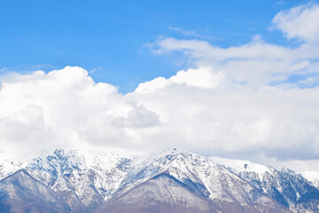 View of cumulus clouds over the mountains