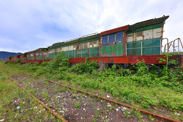 Fototapeta na wymiar Abandoned old train from communist era in Albania