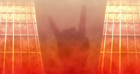 Rock and roll animated background with fire theme, rock hand sign and the guitar neck.