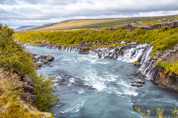 Hraunfossar waterfalls on a cloudy summer day, Iceland