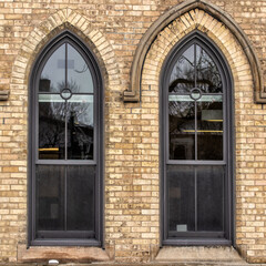 Fototapeta na wymiar Windows in Gothic Revival Academic Building