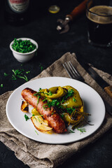 Pork sausage with bell peppers, onions and different herbs