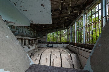 Azure Swimming Pool in Pripyat, Chernobyl exclusion Zone. Chernobyl Nuclear Power Plant Zone of...