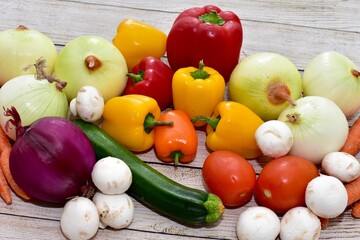 Fresh organic summer harvested vegetables washed and ready for preparing healthy meals and side dishes to share as a family