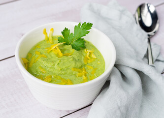 Vegetable green cream soup of cucumbers and avocado