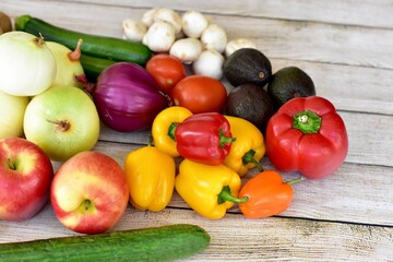 Fresh organic summer harvested vegetables washed and ready for preparing healthy meals and side dishes to share as a family