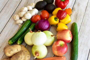 Fresh organic summer harvested vegetables washed and ready for preparing healthy meals and side dishes to share as a family