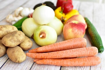 Fresh organic summer harvested vegetables washed and ready for preparing healthy meals and side dishes to share as a family