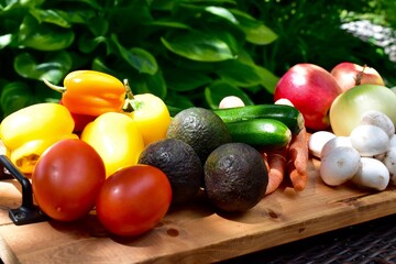 Fresh organic summer harvested vegetables washed and ready for preparing healthy meals and side dishes to share as a family