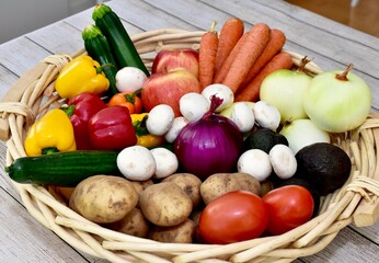 Fresh organic summer harvested vegetables washed and ready for preparing healthy meals and side dishes to share as a family