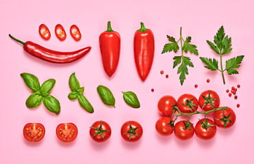 Tomato, basil, spices, bell chili pepper. Vegan diet food, creative composition on pink. Fresh basil, herb, cherry tomatoes layout, cooking sauce colorful concept, top view.