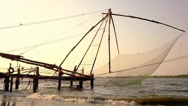 Chinese Fishing nets at sunset in Fort Kochi, Kerala state, India