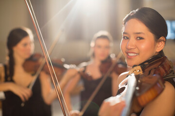 Portrait of violinists performing
