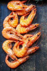 shrimp cooked seafood ready to eat prawn Menu serving size. food background top view copy space organic healthy eating raw pescatarian 