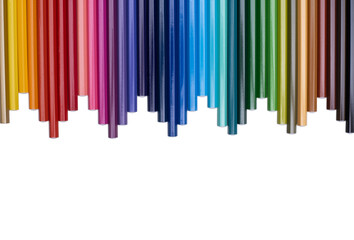 Not sharpened multi-colored wooden pencils are stacked close to each other in the form of a toothed pattern. Isolated image on a white background.
