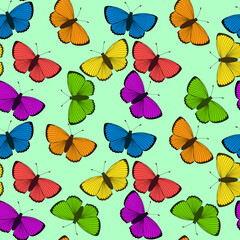 Pattern of multi-colored butterflies on a green. Print for fabric, wrapping paper, postcards. Seamless background.