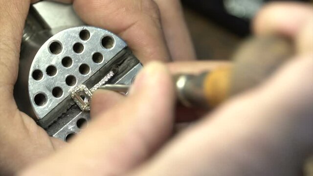diamond ring making. carving the ring. hand made diamond ring product close up