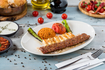 Turkish Adana Kebab with Vegetables on the Plate