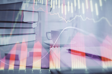 Double exposure of financial chart drawing and desktop with coffee and items on table background. Concept of forex market trading